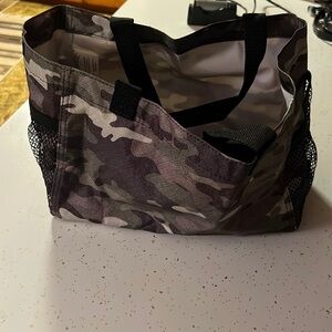 Small 31 tote. Camo. Like new condition.